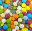 Dragées Confettis chocolat multicolores brillants 90g en tubo plexi